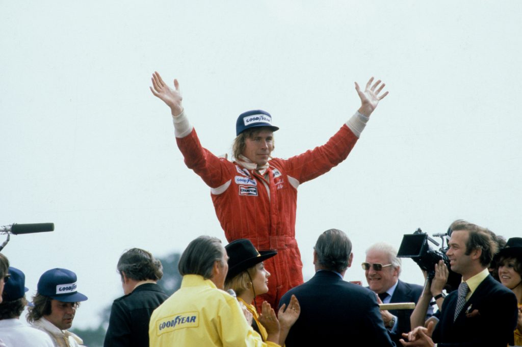 James Hunt celebrating the 1976 Formula 1 World Championship with McLaren, an iconic step in the team’s history.