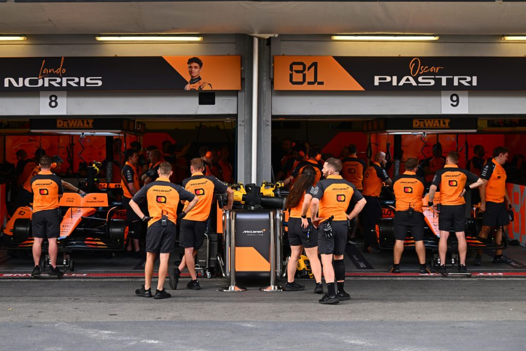 Team members of McLaren at work in the garage during qualifying ahead of the 2025 F1 Azerbaijan Grand Prix