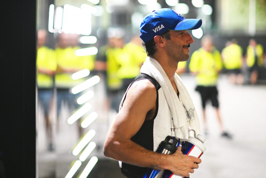 Daniel Ricciardo after his final Formula 1 start at the 2024 Singapore Grand Prix, holding water bottles