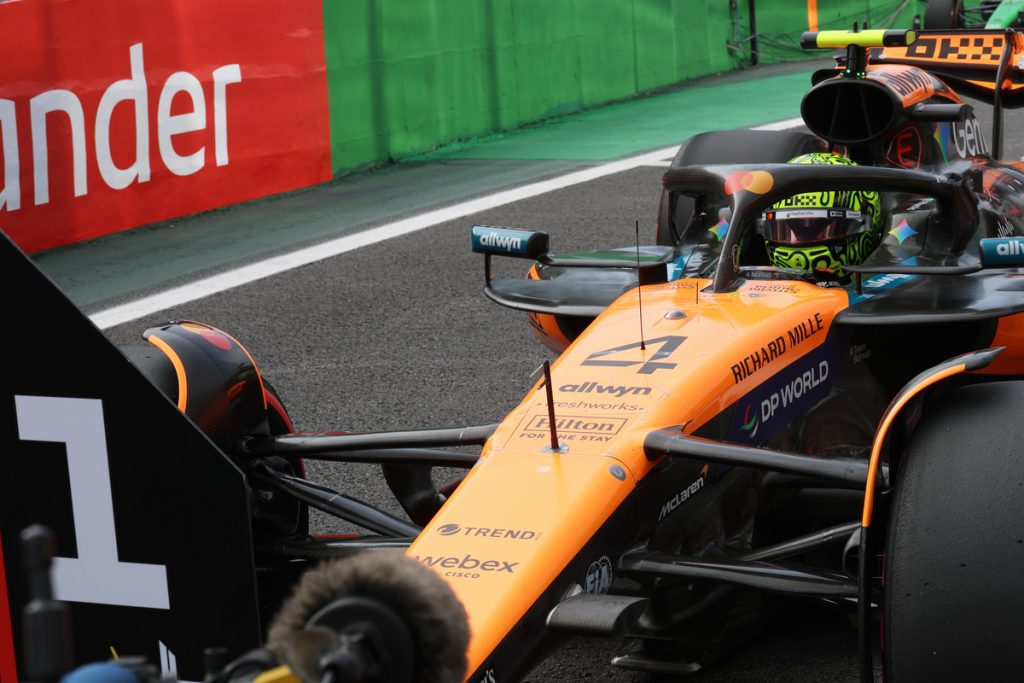 Close-up of Lando Norris in the McLaren cockpit after sprint qualifying at Interlagos.