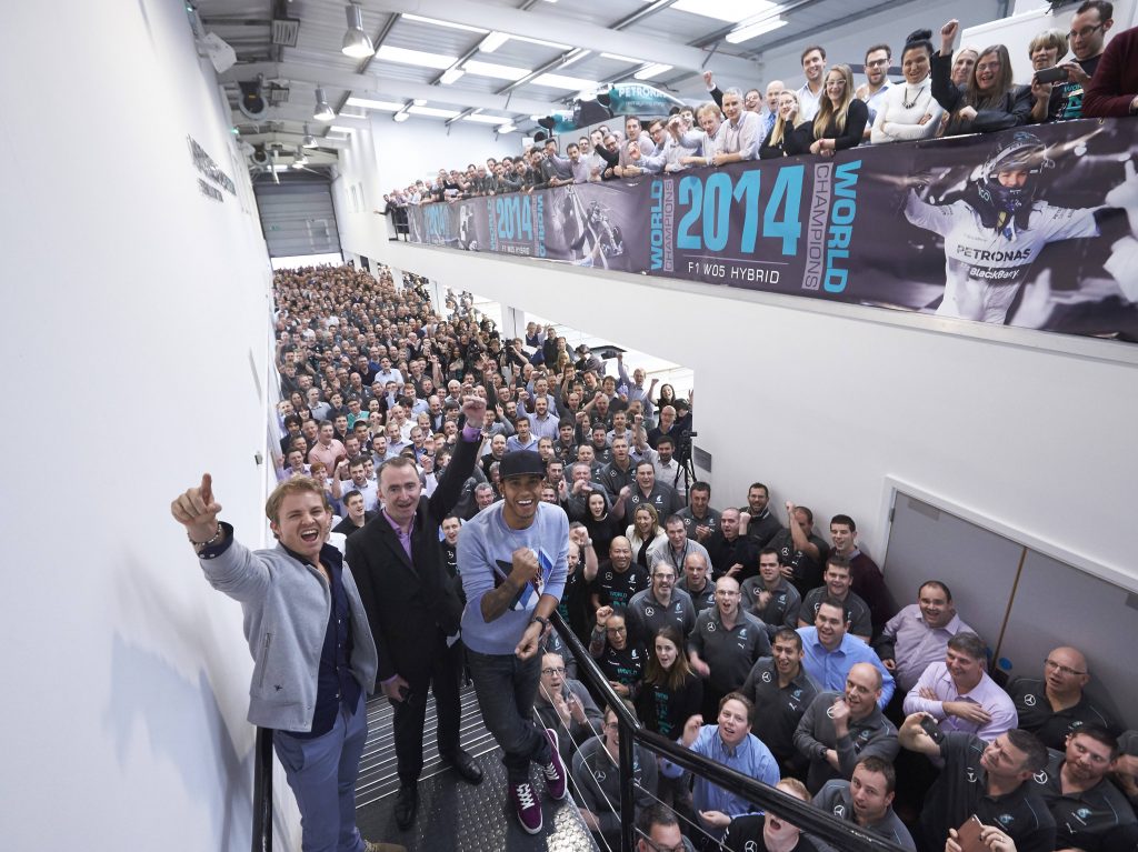 Nico Rosberg and Lewis Hamilton, GP2 champions from 2005 and 2006 celebrating constructors title with Mercedes in 2014.